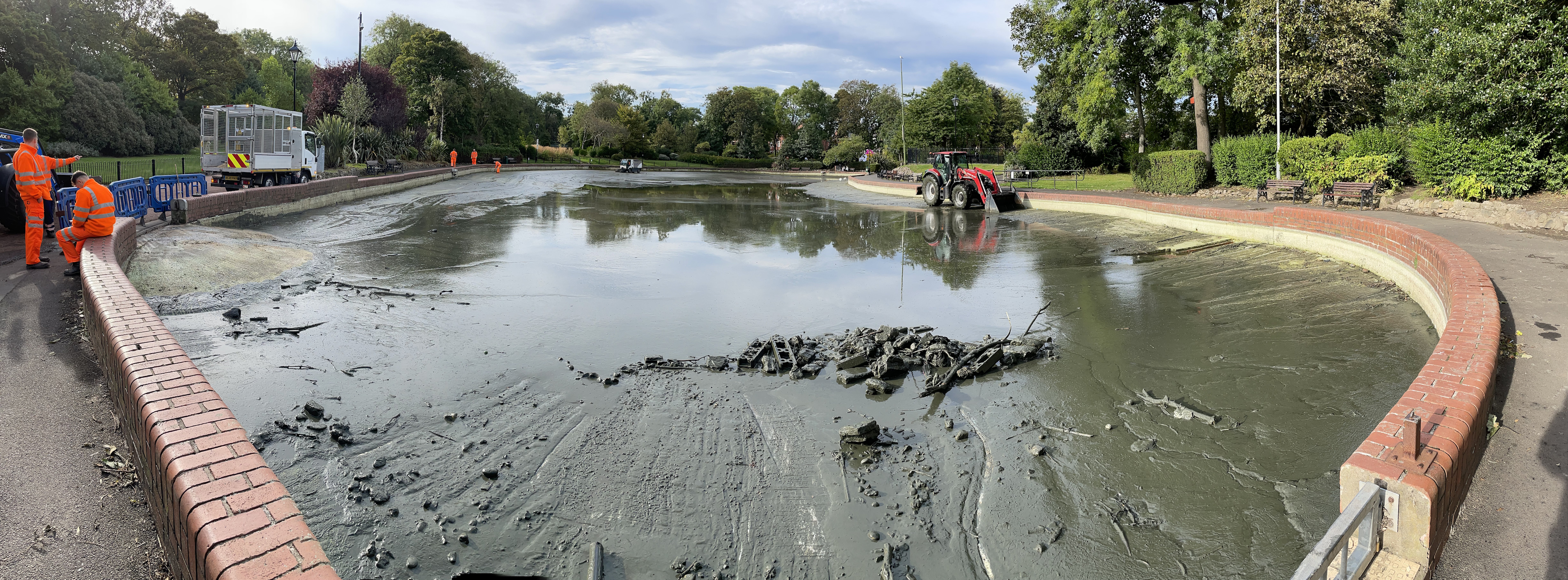 Picture showing Lake empty and the clean up begins 10:30am Friday Oct 8th